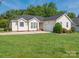 Charming single-story home with a two-car garage and manicured front lawn at 1271 Applewood Ln, York, SC 29745