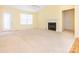 Bright living room featuring a fireplace, vaulted ceiling, and a door leading to the outside at 1271 Applewood Ln, York, SC 29745