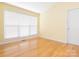 Bright, sun-lit living room with hardwood floors, neutral paint, and big windows at 1271 Applewood Ln, York, SC 29745