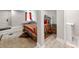 Basement bedroom with a colorful bedspread, decorative rug and a neutral color palette at 128 W End St, Chester, SC 29706