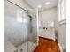 Modern bathroom featuring a spacious shower with glass enclosure and double vanity at 128 W End St, Chester, SC 29706