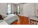 Comfortable bedroom with hardwood floors, ample closet space, and plenty of natural light at 128 W End St, Chester, SC 29706
