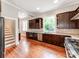 Bright kitchen with stainless steel appliances, custom cabinets, and lots of natural light at 128 W End St, Chester, SC 29706