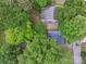 An aerial view of the neighborhood of houses with mature trees providing shade at 1425 3Rd Street Ne Pl, Hickory, NC 28601
