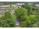 An aerial view of the house with a nearby football field and schools at 1425 3Rd Street Ne Pl, Hickory, NC 28601