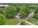 An aerial view of the house with mature trees and spacious lawn at 1425 3Rd Street Ne Pl, Hickory, NC 28601