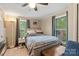 Cozy bedroom featuring a comfortable bed, neutral colors and natural lighting at 1425 3Rd Street Ne Pl, Hickory, NC 28601
