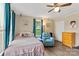 Cozy bedroom featuring a plush bed, comfortable seating, and soft natural light at 1425 3Rd Street Ne Pl, Hickory, NC 28601