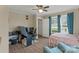 Comfortable bedroom featuring a bed, a chair, and an office setup at 1425 3Rd Street Ne Pl, Hickory, NC 28601