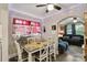Bright dining area with a table, chairs, and festive decor, adjacent to the living room at 1425 3Rd Street Ne Pl, Hickory, NC 28601