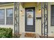 Close-up of the front door with a decorative wreath and 'Welcome' mat at 1425 3Rd Street Ne Pl, Hickory, NC 28601