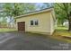View of the detached garage providing covered parking and extra storage space at 1425 3Rd Street Ne Pl, Hickory, NC 28601