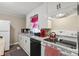 Well-equipped kitchen with a stove, dishwasher, and ample counter space at 1425 3Rd Street Ne Pl, Hickory, NC 28601