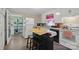 Functional kitchen featuring a center island, ample storage, and white appliances at 1425 3Rd Street Ne Pl, Hickory, NC 28601