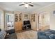 Spacious living room featuring hardwood floors, built-in shelving, and ample natural light at 1425 3Rd Street Ne Pl, Hickory, NC 28601