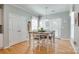 The dining area features a wooden table and chairs and has plenty of natural light at 14727 Brannock Hills Dr, Charlotte, NC 28278