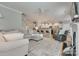 An open concept living room flows into the kitchen area with counter seating at 14727 Brannock Hills Dr, Charlotte, NC 28278