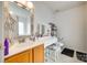 Vanity with mirror, toilet, and decorative accents in bathroom at 1583 Cold Creek Pl, Huntersville, NC 28078