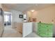 Hallway with white walls and trim, neutral carpet, and colorful chest at 1583 Cold Creek Pl, Huntersville, NC 28078