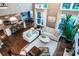 Open floor plan offers ample seating with a view of the modern kitchen and adjacent dining area at 159 Holly Ridge Dr, Mooresville, NC 28115