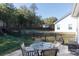 Outdoor patio with seating, lovely backyard and privacy fence at 16142 Commodore Dr, Lancaster, SC 29720
