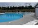Community pool with plenty of lounge chairs and shade at 16142 Commodore Dr, Lancaster, SC 29720