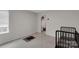 The bedroom has carpeted floors, a window, and a closet for storing all of their clothes and toys at 16404 Wavenly House Dr, Charlotte, NC 28273