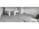 Large bonus room with neutral paint, carpet, and several doorways at 16404 Wavenly House Dr, Charlotte, NC 28273