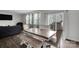 Dining area with a wooden table, bench, chairs, and natural lighting at 16404 Wavenly House Dr, Charlotte, NC 28273
