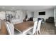 Open-concept living space featuring a kitchen, dining area, and stairs at 16404 Wavenly House Dr, Charlotte, NC 28273
