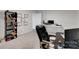 Office space with a large bookshelf and framed certificates on the wall at 16404 Wavenly House Dr, Charlotte, NC 28273