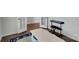 Study or office area with a small table, chair, and keyboard at 16404 Wavenly House Dr, Charlotte, NC 28273