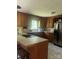Kitchen featuring wood cabinets, tile countertops, and stainless steel appliances at 168 Pleasant Creek Dr, Cleveland, NC 27013