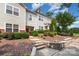 Two-story townhouse with inviting entrance and landscaped garden at 18137 Amberwood Glen Dr, Cornelius, NC 28031