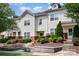 Charming townhouse featuring a well-manicured lawn and inviting front entrance at 18137 Amberwood Glen Dr, Cornelius, NC 28031