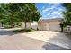 Three car garage with ample parking space on a sunny day at 18137 Amberwood Glen Dr, Cornelius, NC 28031