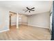 Spacious living room with wood floors with a ceiling fan at 18137 Amberwood Glen Dr, Cornelius, NC 28031