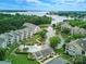 Wonderful aerial view of lakeside condos, a pool, and manicured green spaces at 18817 Nautical Dr # 302, Cornelius, NC 28031