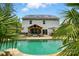 Backyard with a pool, outdoor seating, gazebo, and solar panels on the roof at 1970 Topaz Plz, Davidson, NC 28036