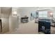Multi-functional bonus room features a lounge area, workspace, and a foosball table for entertainment at 1970 Topaz Plz, Davidson, NC 28036