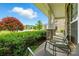 Inviting front porch with seating area and view of the manicured lawn and neighborhood at 1970 Topaz Plz, Davidson, NC 28036