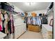 Large walk-in closet with built-in shelving and ample storage space for clothing and accessories at 1970 Topaz Plz, Davidson, NC 28036