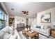 Stylishly furnished living room with neutral tones, modern decor, and a cozy seating area at 203 Rustling Waters Dr, Mooresville, NC 28117