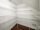 Walk-in pantry with wire shelving for optimal organization and storage at 203 Rustling Waters Dr, Mooresville, NC 28117