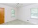 Bedroom features two windows and neutral colored carpet at 205 Hillcrest Ave, Rock Hill, SC 29732