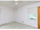 Bright bedroom features a ceiling fan and a window with natural light at 205 Hillcrest Ave, Rock Hill, SC 29732