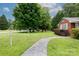 The front yard features a stone walkway that leads to the house and a lamp post at 205 Hillcrest Ave, Rock Hill, SC 29732