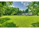 A spacious backyard features a shed and white house exterior at 284 Cedar Grove Rd, Clover, SC 29710