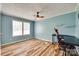 Bedroom with plank flooring, dual windows, ceiling fan, and office equipment at 284 Cedar Grove Rd, Clover, SC 29710
