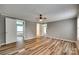 Spacious bedroom with plank flooring, and doorways leading to other rooms at 284 Cedar Grove Rd, Clover, SC 29710